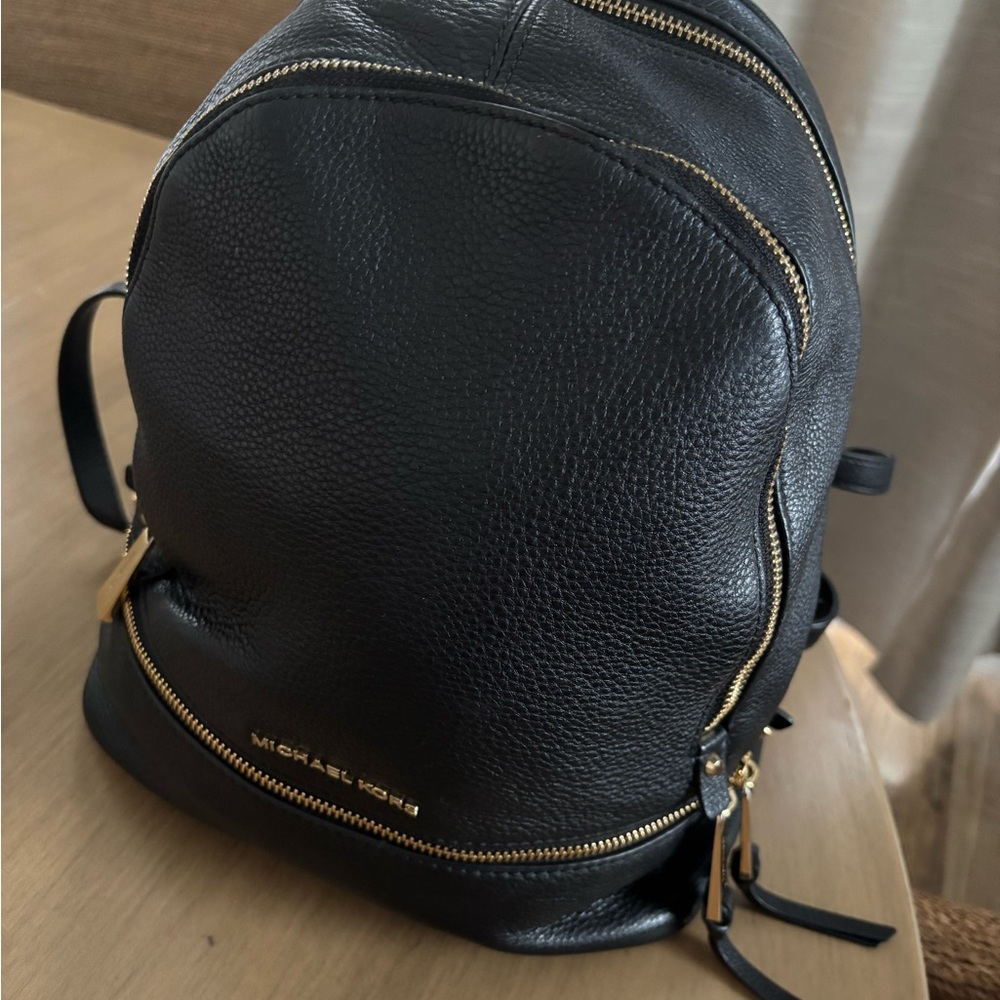 Michael Kors Black Backpack with Gold Zippers